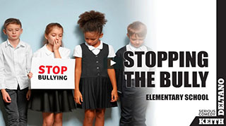 stop bullying activities for teachers and students – elementary students holding a stop bullying sign